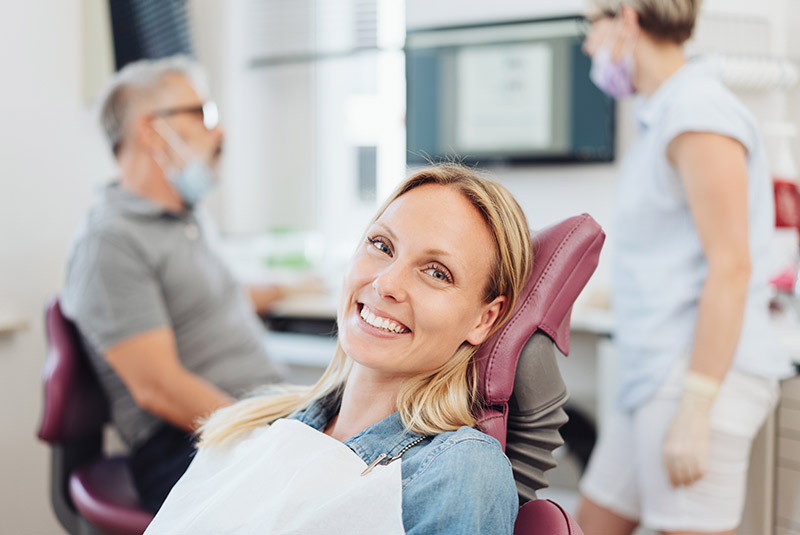 Very nice lady smiling in dental chair